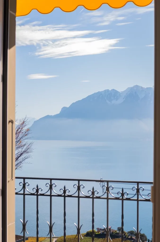 Lake-view balcony of a room at Le Baron Tavernier